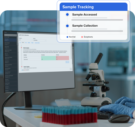laboratory sample tracking interface displayed on a computer screen next to scientific equipment